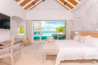 Отель Malahini Kuda Bandos